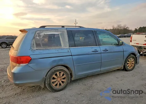 2010 Honda Odyssey Exl z USA, uszkodzony, nr VIN 5FNRL3H70AB088701